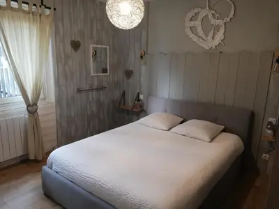 Un ou plusieurs lits dans un hébergement de l'établissement Au Petit Bonheur Charmant Gite Colmar
