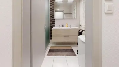 Salle de bains dans l'établissement Les Charpentiers