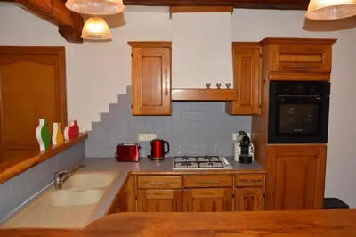 Cuisine ou kitchenette dans l'établissement Le Cerf