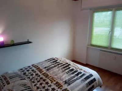 Un ou plusieurs lits dans un hébergement de l'établissement Appartement 3 pièces