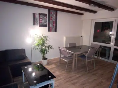 Coin salon dans l'établissement Appartement 3 pièces