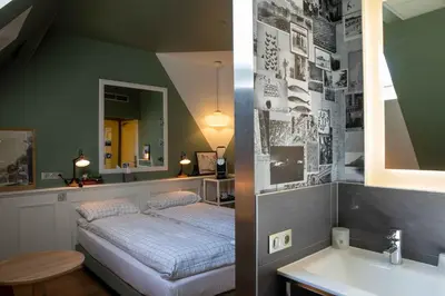 Un ou plusieurs lits dans un hébergement de l'établissement Hôtel et Spa La Villa K - Basel Airport
