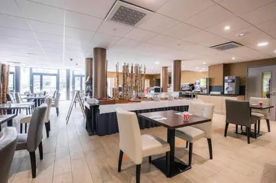 Restaurant ou autre lieu de restauration dans l'établissement Aparthotel Adagio Bâle Mulhouse Aeroport