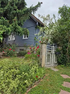 Jardin de l'établissement Chalet aux 2 sapins
