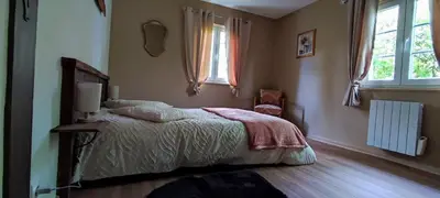 Un ou plusieurs lits dans un hébergement de l'établissement Chalet aux 2 sapins