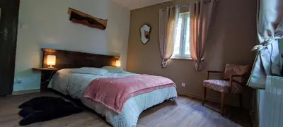 Un ou plusieurs lits dans un hébergement de l'établissement Chalet aux 2 sapins