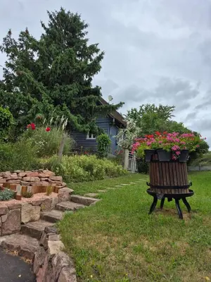 Jardin de l'établissement Chalet aux 2 sapins
