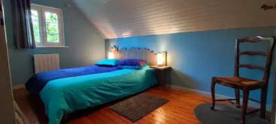 Un ou plusieurs lits dans un hébergement de l'établissement Chalet aux 2 sapins