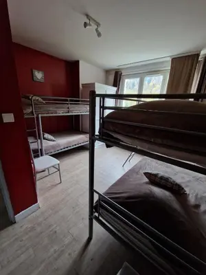 Un ou plusieurs lits dans un hébergement de l'établissement Chalet La Zaubette 8 personnes