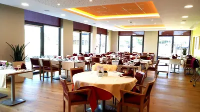 Restaurant ou autre lieu de restauration dans l'établissement Domitys L'organdi