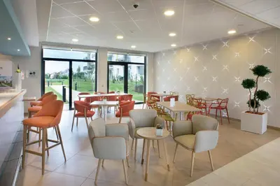 Coin salon dans l'établissement Domitys L'organdi