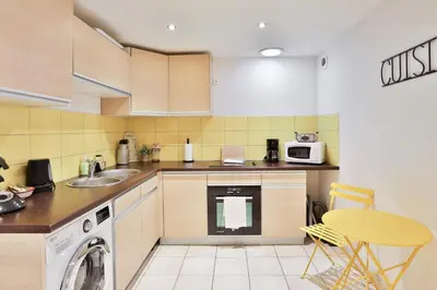 Cuisine ou kitchenette dans l'établissement Gite 