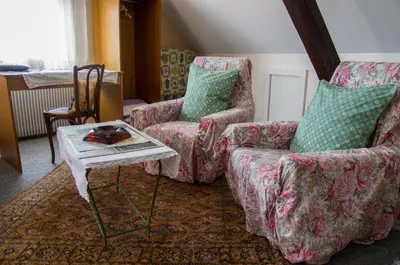 Coin salon dans l'établissement Hôtel de Bâle