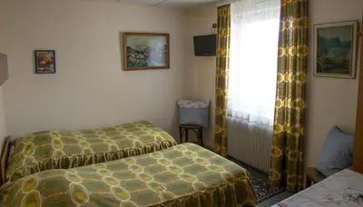 Un ou plusieurs lits dans un hébergement de l'établissement Hôtel de Bâle