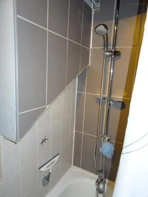 Salle de bains dans l'établissement La SALAMANDRE