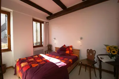 Un ou plusieurs lits dans un hébergement de l'établissement Apart' City Break Colmar