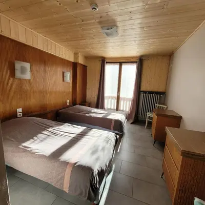 Un ou plusieurs lits dans un hébergement de l'établissement Hotel du lac des Corbeaux
