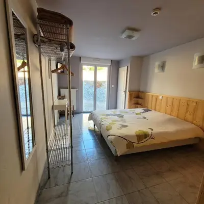 Un ou plusieurs lits dans un hébergement de l'établissement Hotel du lac des Corbeaux