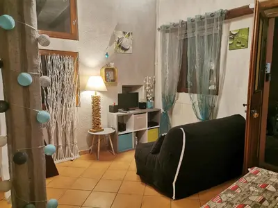Coin salon dans l'établissement Le gite de Coco