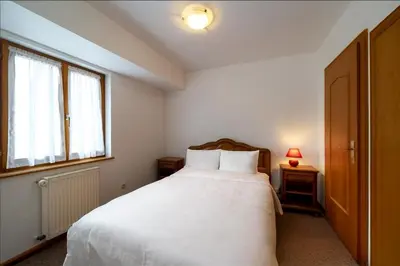 Un ou plusieurs lits dans un hébergement de l'établissement Hôtel A la Vignette - COLMAR-NORD