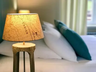 Un ou plusieurs lits dans un hébergement de l'établissement LES ÉCRINS - B&B with jacuzzi