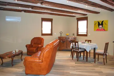 Coin salon dans l'établissement maison d en haut