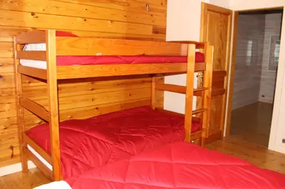 Un ou plusieurs lits dans un hébergement de l'établissement Chalet centaurée - Rémy HEROLD