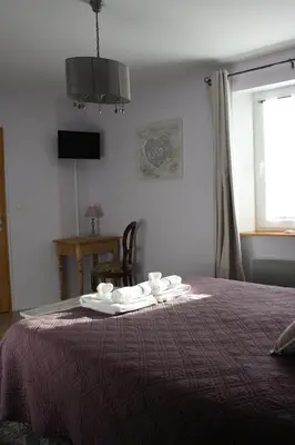 Un ou plusieurs lits dans un hébergement de l'établissement Au Coeur d'Alsace Chambres d'hôtes