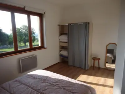 Un ou plusieurs lits dans un hébergement de l'établissement cottage pleine nature