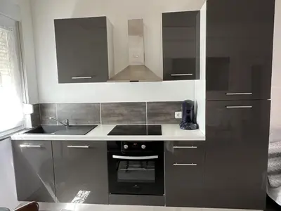 Cuisine ou kitchenette dans l'établissement Gite des cigognes bleu