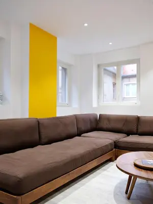 Coin salon dans l'établissement Les Suites Du Cygne