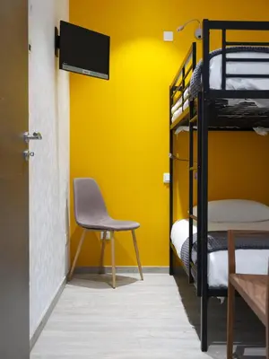 Un ou plusieurs lits dans un hébergement de l'établissement Les Suites Du Cygne