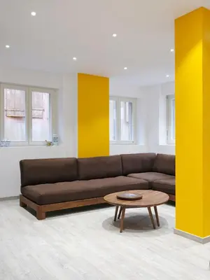 Coin salon dans l'établissement Les Suites Du Cygne