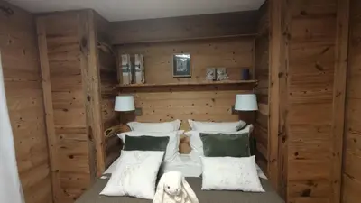 Un ou plusieurs lits dans un hébergement de l'établissement L'instant chalet Lodge 17