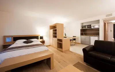Un ou plusieurs lits dans un hébergement de l'établissement Hotel Résidence La Gioia