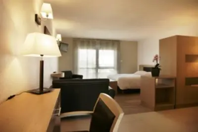Un ou plusieurs lits dans un hébergement de l'établissement Hotel Résidence La Gioia