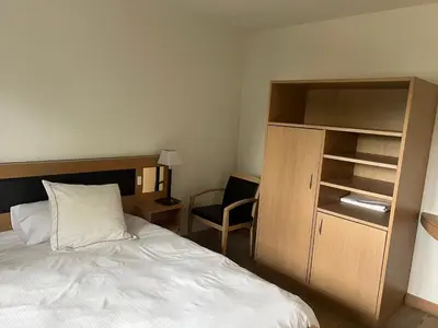 Un ou plusieurs lits dans un hébergement de l'établissement Hotel Résidence La Gioia