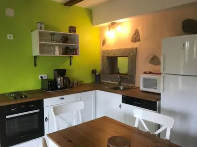 Cuisine ou kitchenette dans l'établissement Gîte La Petite Finlande