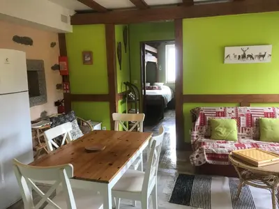 Coin salon dans l'établissement Gîte La Petite Finlande
