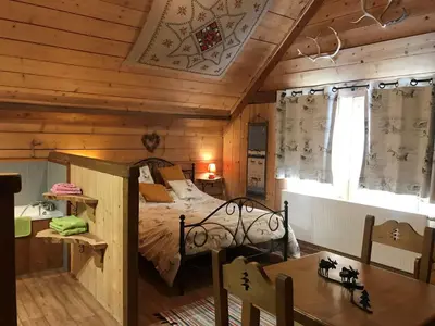Un ou plusieurs lits dans un hébergement de l'établissement La Petite Finlande Chambre d'hôtes Carélie et Laponie