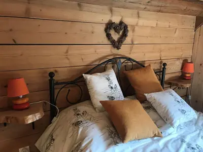 Un ou plusieurs lits dans un hébergement de l'établissement La Petite Finlande Chambre d'hôtes Carélie et Laponie