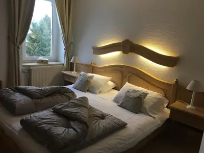 Un ou plusieurs lits dans un hébergement de l'établissement Maison La Devinière - sauna et spa compris accessibles toute l'année