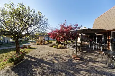 Jardin de l'établissement Charme Hôtel, Montbéliard Sud