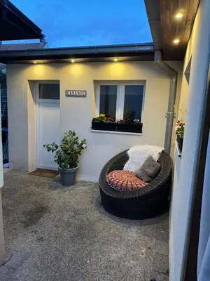 Coin salon dans l'établissement Gîte & Spa CASANOU