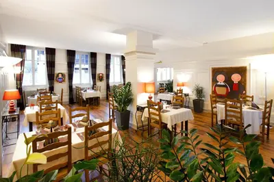 Coin salon dans l'établissement Hôtel Restaurant La Cigogne