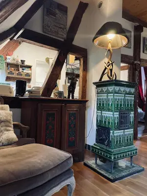 Coin salon dans l'établissement Gîte Maison des Vignerons