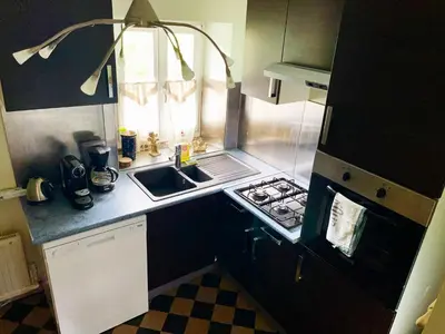 Cuisine ou kitchenette dans l'établissement Gîte Maison des Vignerons