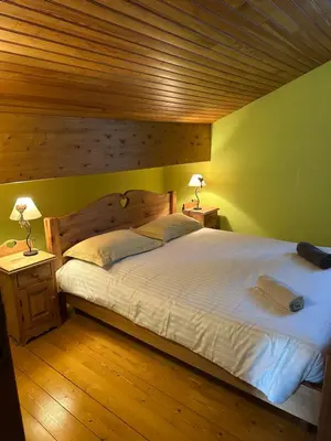 Un ou plusieurs lits dans un hébergement de l'établissement Les Loges du Lac - Appartement avec Terrasse