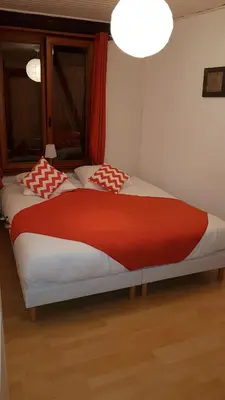 Un ou plusieurs lits dans un hébergement de l'établissement Maison centre ville Colmar Jacuzzi Jardin et climatisation