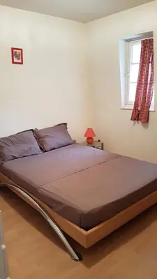 Un ou plusieurs lits dans un hébergement de l'établissement Villa Spetz